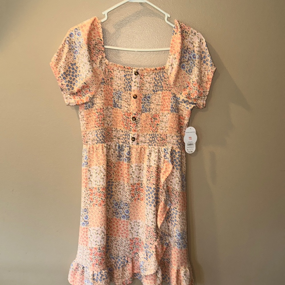 Girls floral sun dress. Size XXL (18)